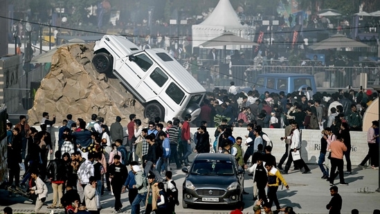 For an all-terrain vehicle, a unique display was seen with the car mounted on a rocky exhibit(AFP)