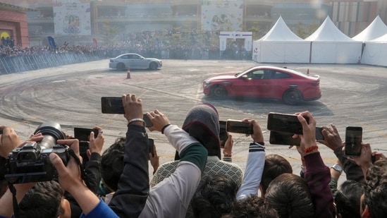 BMW car drivers enthralled the audience by performing stunts at the Bharat Mobility Global Expo 2025(Arun Sharma/PTI)