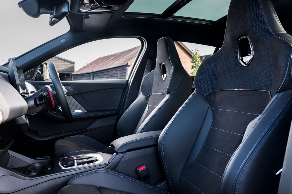 Interior view of a car's front seats.