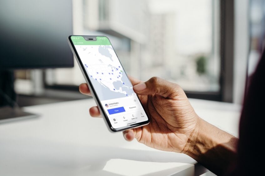 Person using NordVPN mobile app