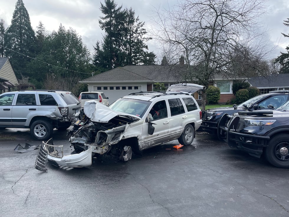 2 face charges after stolen SUV smashes Portland police car, speeds away