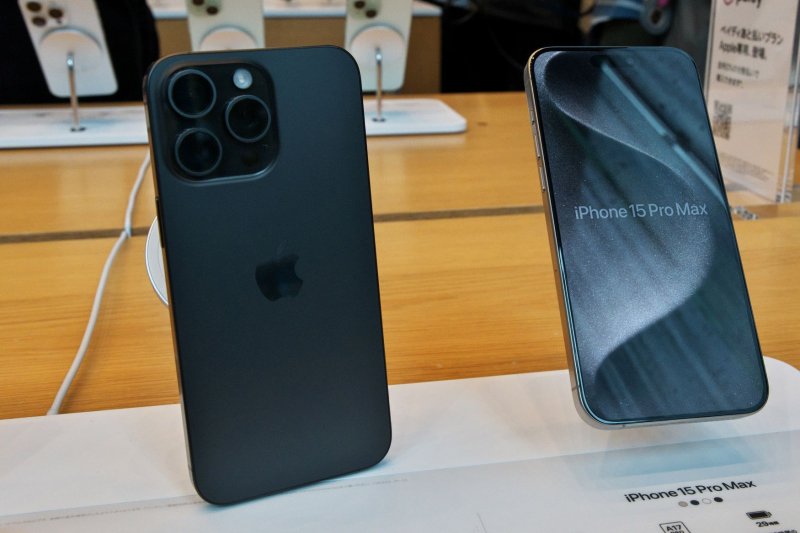 Two of Apple's new iPhone 15 Pro Max mobile phones are displayed at the Apple Omotesando store in Tokyo, Japan, on Sept. 22, 2023. File Photo by Keizo Mori/UPI