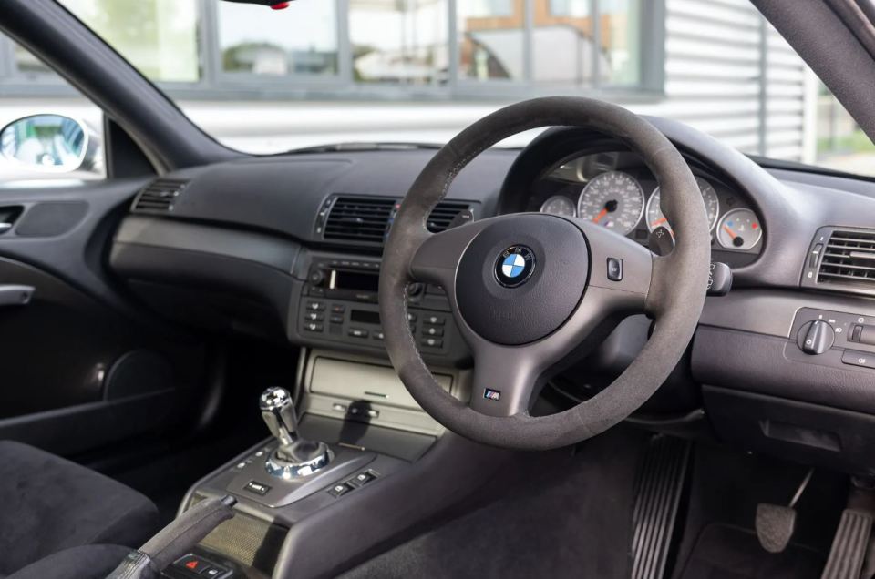 Interior view of a 2004 BMW E46 M3 CSL.