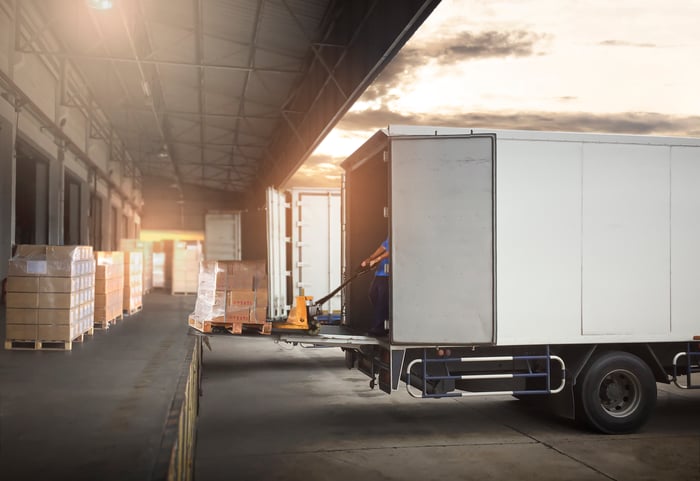 A truck in a loading dock.