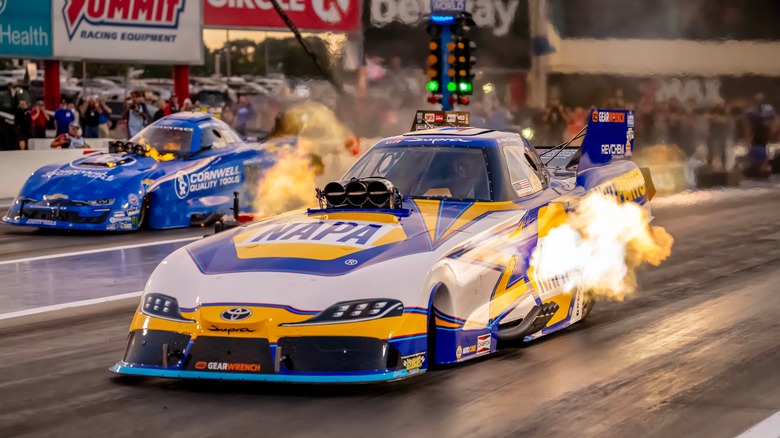 NHRA Funny Car Series driver Ron Capps runs down the lane during a qualifying session for the Betway Carolina Nationals in Concord, North Carolina, in 2023.