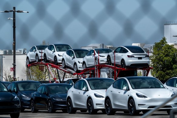 Tesla cars in front of the company’s plant in California. The carmaker has several supply agreements with Australian miners, including Liontown.