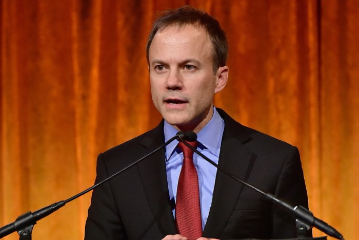 David Rhodes speaks onstage at an event