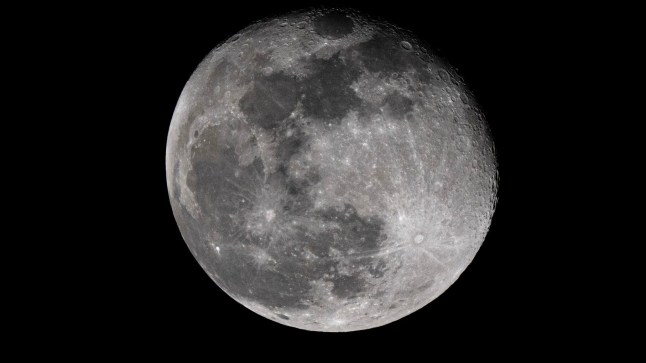 This photograph shows a Waning Gibbous moon over Montreuil, eastern suburb of Paris, on January 15, 2025. (Photo by Martin LELIEVRE / AFP) (Photo by MARTIN LELIEVRE/AFP via Getty Images)