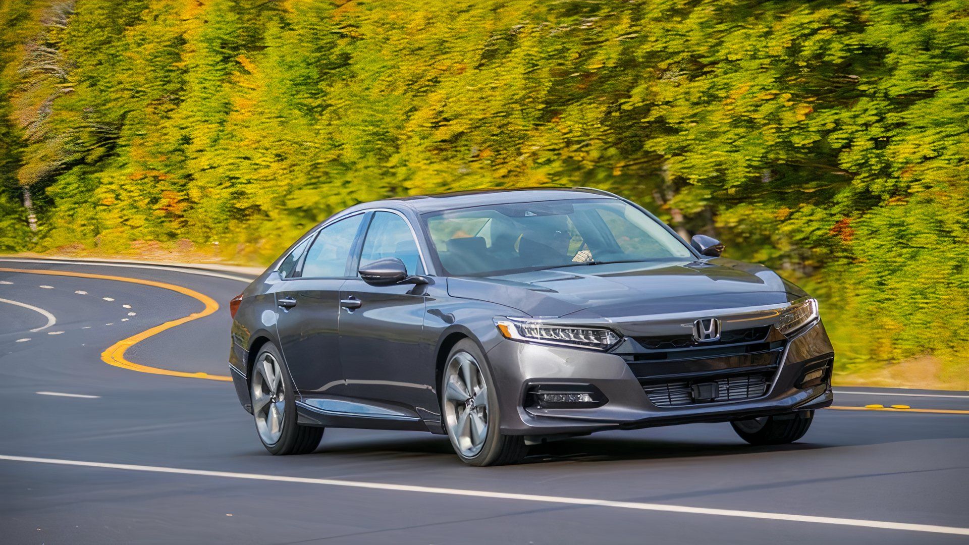 Front 3/4 action shot of a 2020 Honda Accord