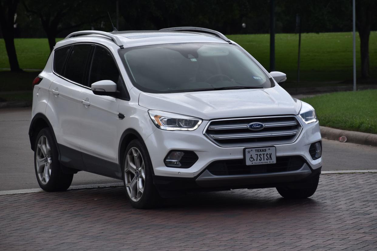 white Ford Escape