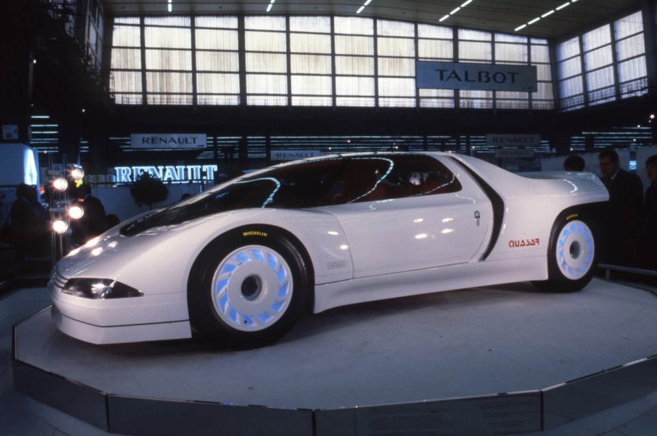 White Peugeot Quasar concept car on display.