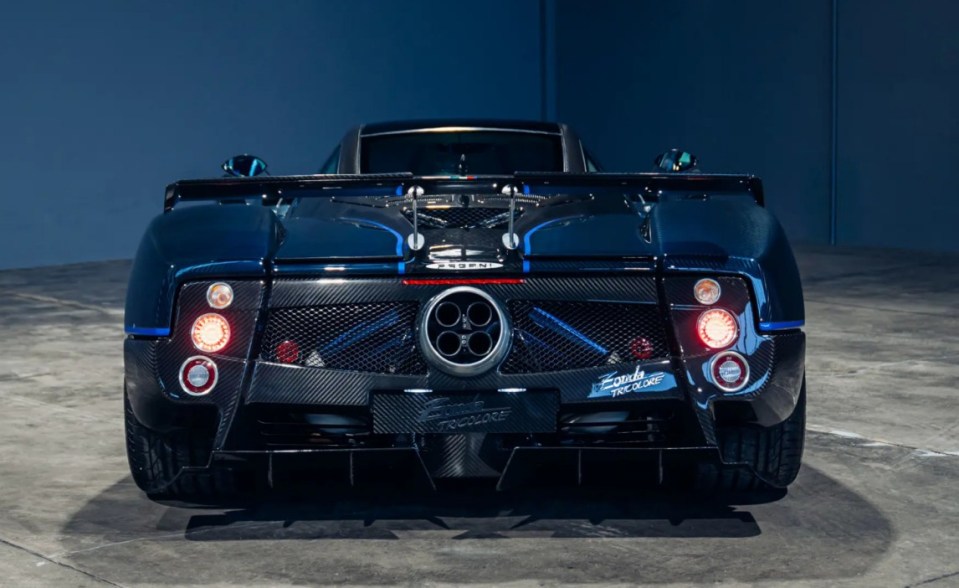 The car features a small vertical fin on top of the engine cover that assists in channelling air into the engine and LED running lights below the headlights. This STATE-OF-THE-ART 2011 celebration Pagani Zonda Tricolore - with a 7.3-litre V12 engine - could be yours as it hits the market. The incredible supercar is one of three built to celebrate the 50th anniversary of the Frecce Tricolori - the aerobatic demonstration team of the Italian Air Force, known for its signature green, white, and red smoke trails. Images show the stunning model finished in a clear blue lacquer coating and matching the livery of the Frecce Tricolori¿s Aermacchi MB-339 jets with Italian flag pinstriping. The car features a small vertical fin on top of the engine cover that assists in channelling air into the engine and LED running lights below the headlights. This model is only the second of three Tricolore built and fitted with a 7.3-litre Mercedes-Benz AMG-sourced V-12 engine, producing 670 bhp and 780 nm of torque. The car is on sale via auction by RM Sotheby with the bidding opening on Monday, 24 February 2025. ¿This car is amongst the most desirable iterations of the vaunted Zonda,¿ reads the listing. ¿It is being offered from the collection of its third owner and currently registered in Germany. ¿The car is exceptionally well-preserved throughout, and at the time of cataloguing, its odometer shows 690 miles from new. ¿While the jets of the Frecce Tricolore perform aerobatics in the sky, the Tricolores aerobatics on four wheels is no less impressive to experience, and the Tricolore celebrates Italian passion and panache with flair equalled only by its aeronautical equivalent.¿ ENDS.