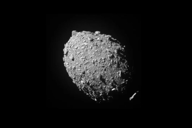 This image provided by NASA shows the asteroid Dimorphos, captured by NASA???s DART mission just two seconds before the spacecraft struck its surface, on Sept. 26, 2022. (NASA/Johns Hopkins APL via AP)