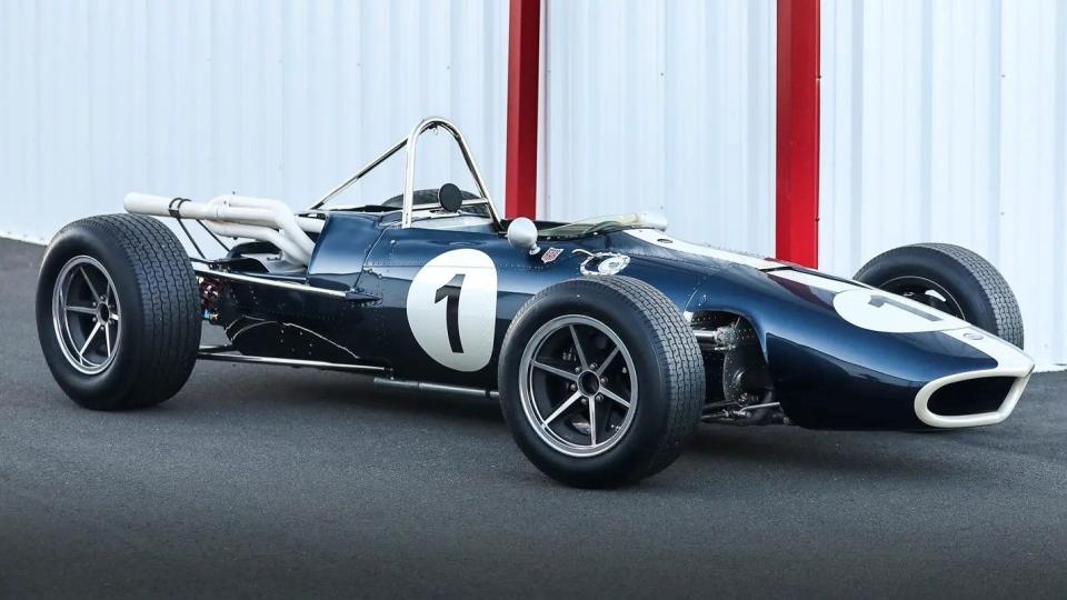 racing car with a prominent number 1 displayed on the side