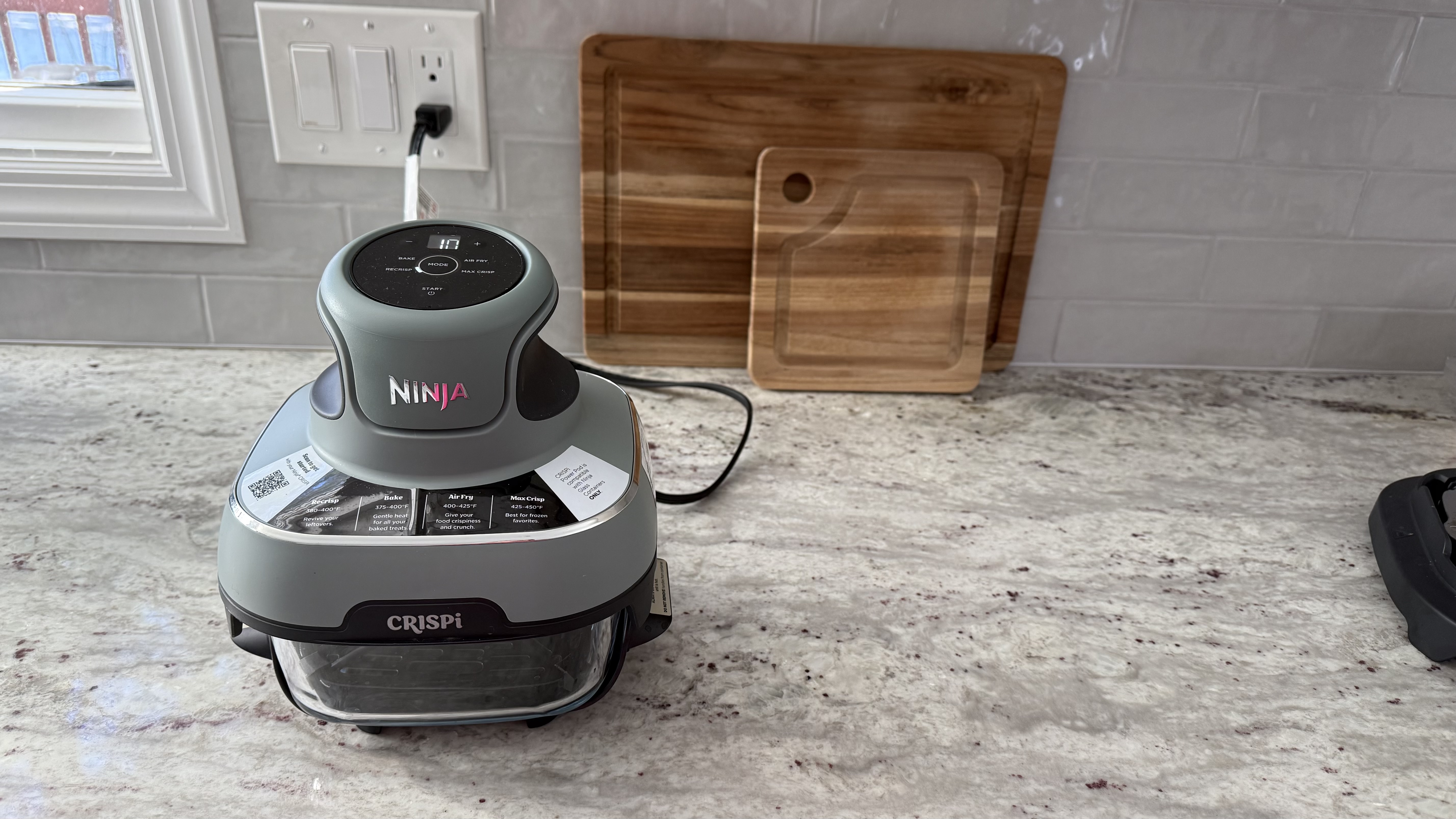 Ninja Crispi Portable Glass Air Fryer Cooking System on counter