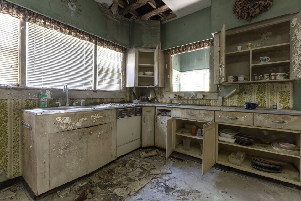 Kitchen cabinets are still full of dishes GEORGIA, USA THIS VINTAGE car collector abandoned his home over a decade ago yet his hoard of classic American cars stands as a testament to the petrol-head¿s passion¿¿Images show a valuable collection of vintage cars including a Pacard, a Cadillac sedan and multiple Buicks.¿Evidence in the home suggest the property has been abandoned for 15 years as the last calendar hanging is dated 2008.¿¿These images were captured by urban explorer Leland Kent known online as Abandoned Southeast in Georgia, USA.¿¿¿The former home of an antique car collector sits deep in the woods of rural Georgia,¿ said Leland on his blog.¿¿¿According to property records, the home dates to the early 20th century, although it appears it could be much older.¿¿¿It has a unique layout with attached rooms rather than a central hallway.¿¿¿In the kitchen, there is a calendar dated 2008 that gives some indication of when the house was last occupied.¿¿¿In the small, detached garage behind the house are a Packard and Cadillac sedan, as well as several old Buicks.¿¿Find out more on Lelands Blog.¿¿ENDS