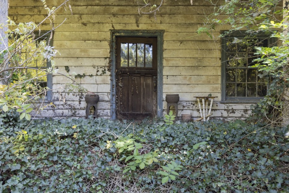 The exterior of the property GEORGIA, USA THIS VINTAGE car collector abandoned his home over a decade ago yet his hoard of classic American cars stands as a testament to the petrol-head¿s passion¿¿Images show a valuable collection of vintage cars including a Pacard, a Cadillac sedan and multiple Buicks.¿Evidence in the home suggest the property has been abandoned for 15 years as the last calendar hanging is dated 2008.¿¿These images were captured by urban explorer Leland Kent known online as Abandoned Southeast in Georgia, USA.¿¿¿The former home of an antique car collector sits deep in the woods of rural Georgia,¿ said Leland on his blog.¿¿¿According to property records, the home dates to the early 20th century, although it appears it could be much older.¿¿¿It has a unique layout with attached rooms rather than a central hallway.¿¿¿In the kitchen, there is a calendar dated 2008 that gives some indication of when the house was last occupied.¿¿¿In the small, detached garage behind the house are a Packard and Cadillac sedan, as well as several old Buicks.¿¿Find out more on Lelands Blog.¿¿ENDS