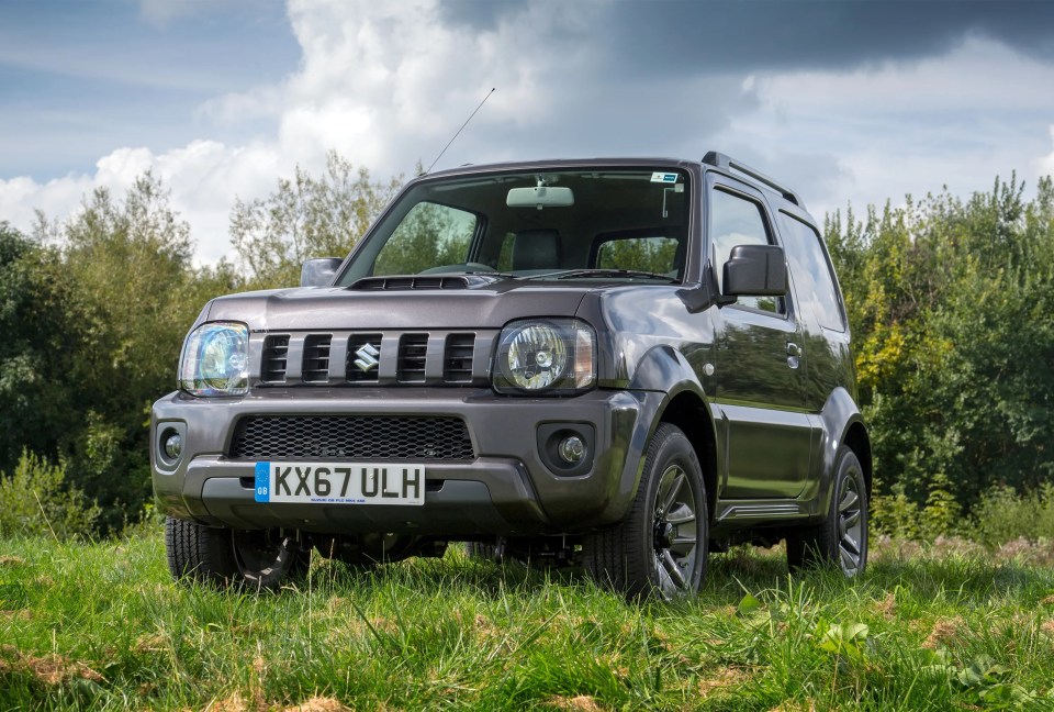 Suzuki Jimny SZ4 ALLGRIP model in a field.