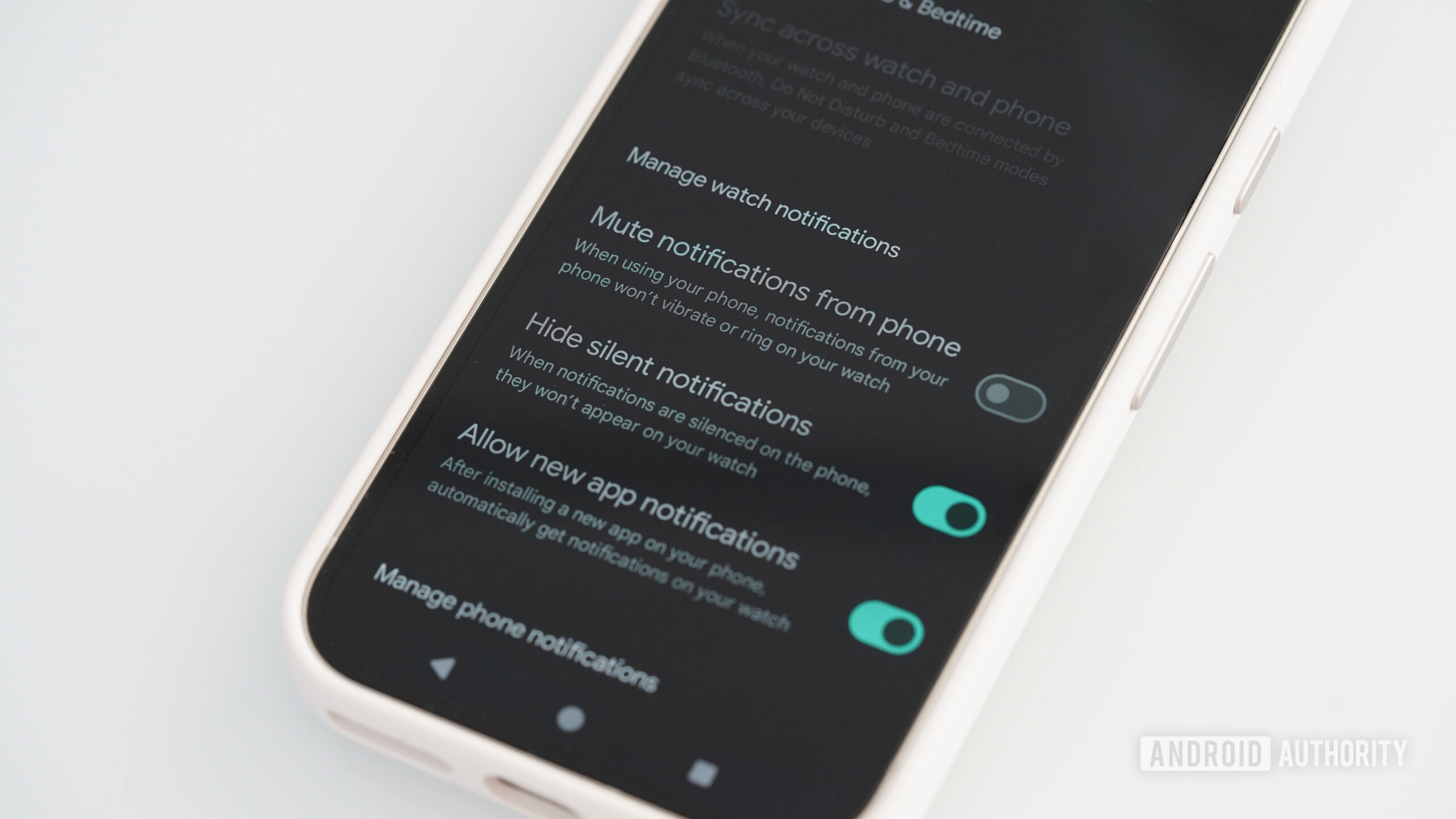 A Google Pixel 9 displays a user's Pixel Watch Notification settings.