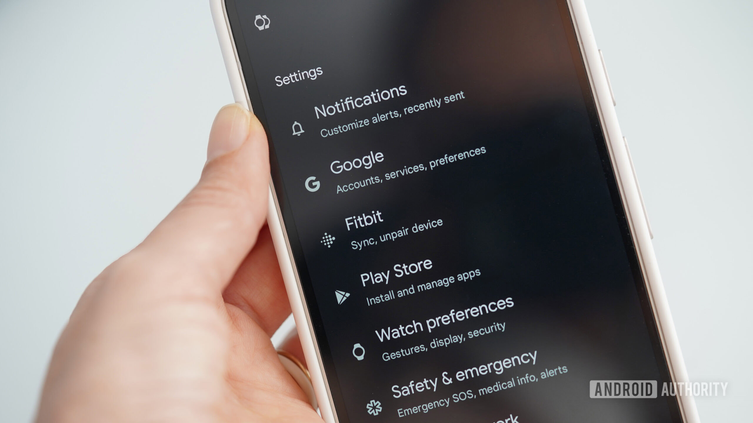 A Google Pixel 9 user explores the available Pixel Watch settings.