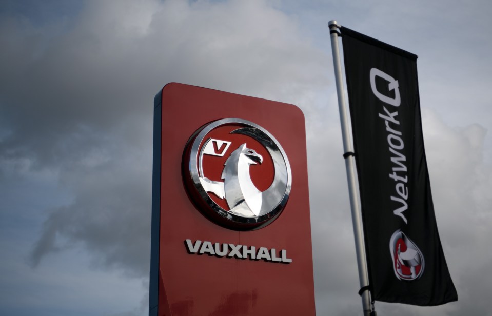 Vauxhall dealership sign with logo.