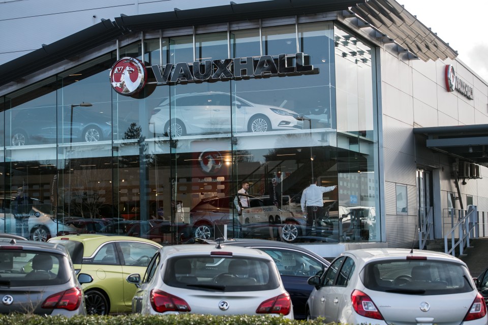 Vauxhall dealership with cars.