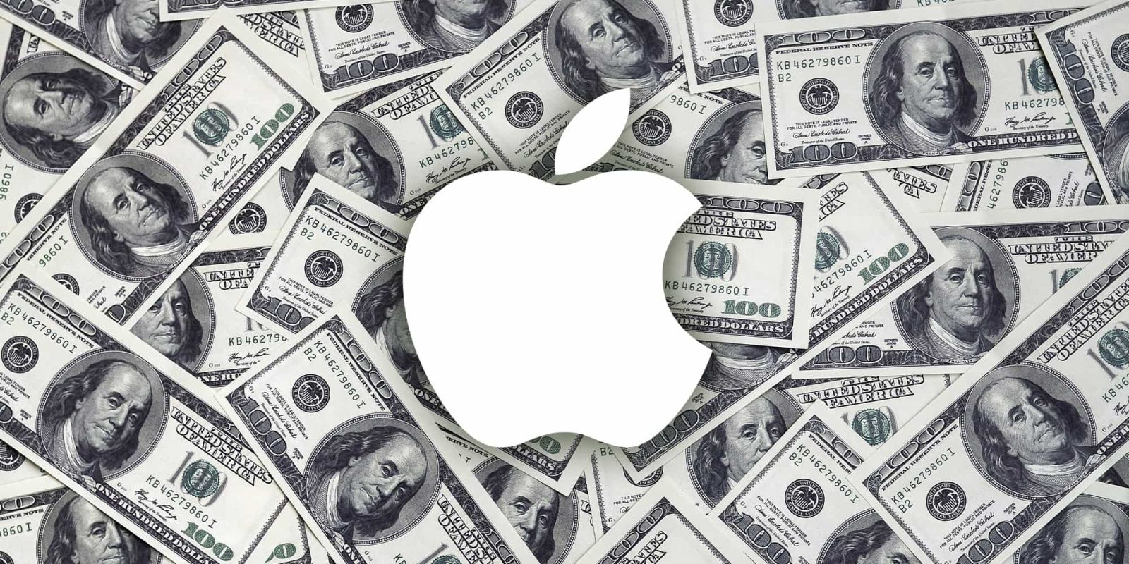 Apple logo on top of lots of money