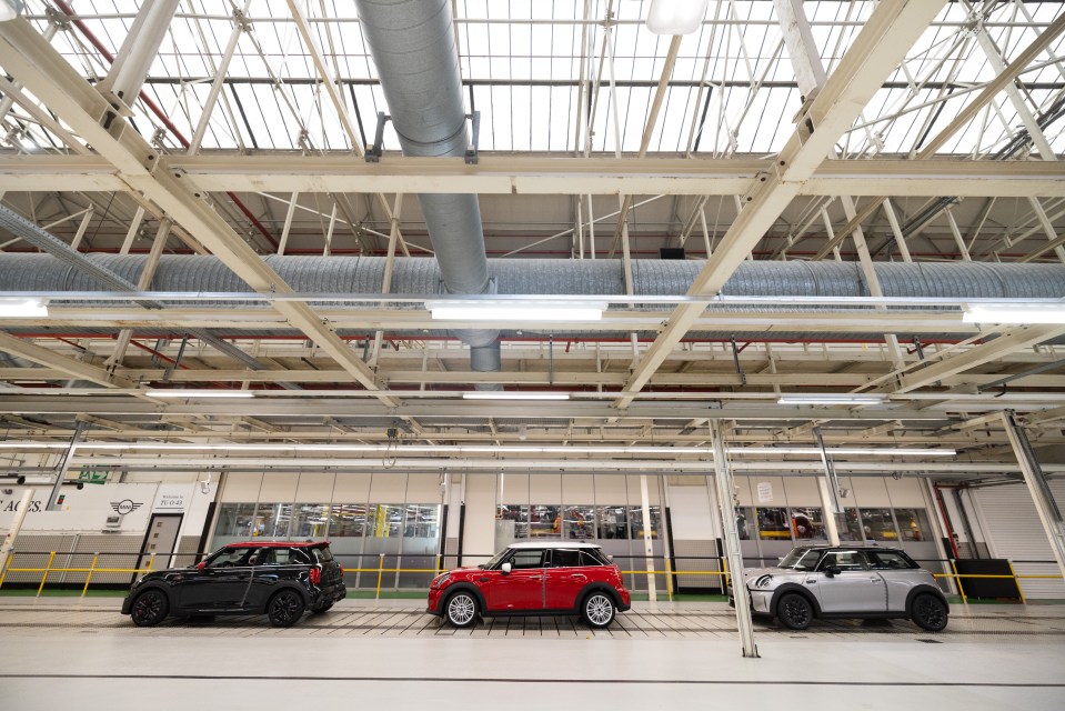 Mini Coopers on a production line.