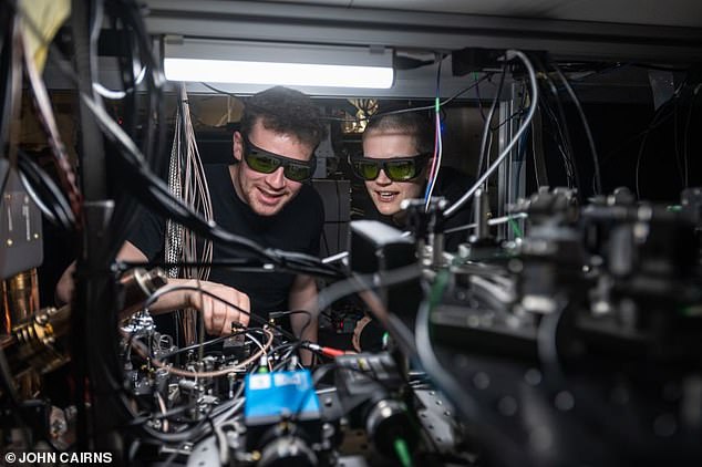 Dougal Main and Beth Nichol working on the distributed quantum computer.