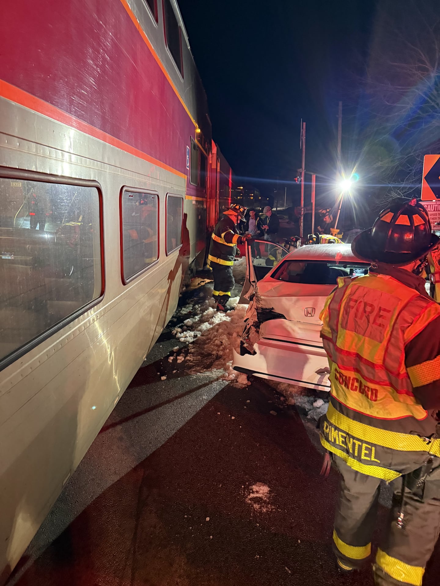 An MBTA Commuter Rail train and car made contact on Sunday.