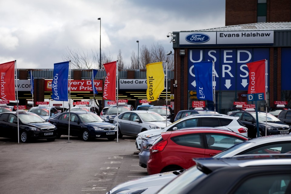 Evans Halshaw used car dealership with many cars in the lot.