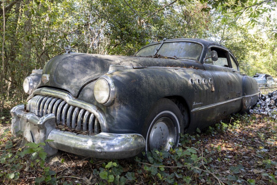 A large black vintage car GEORGIA, USA THIS VINTAGE car collector abandoned his home over a decade ago yet his hoard of classic American cars stands as a testament to the petrol-head¿s passion¿¿Images show a valuable collection of vintage cars including a Pacard, a Cadillac sedan and multiple Buicks.¿Evidence in the home suggest the property has been abandoned for 15 years as the last calendar hanging is dated 2008.¿¿These images were captured by urban explorer Leland Kent known online as Abandoned Southeast in Georgia, USA.¿¿¿The former home of an antique car collector sits deep in the woods of rural Georgia,¿ said Leland on his blog.¿¿¿According to property records, the home dates to the early 20th century, although it appears it could be much older.¿¿¿It has a unique layout with attached rooms rather than a central hallway.¿¿¿In the kitchen, there is a calendar dated 2008 that gives some indication of when the house was last occupied.¿¿¿In the small, detached garage behind the house are a Packard and Cadillac sedan, as well as several old Buicks.¿¿Find out more on Lelands Blog.¿¿ENDS