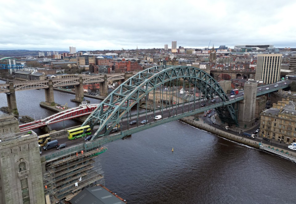 Tyne Bridge and Sage Gateshead concert hall in Gateshead, UK.