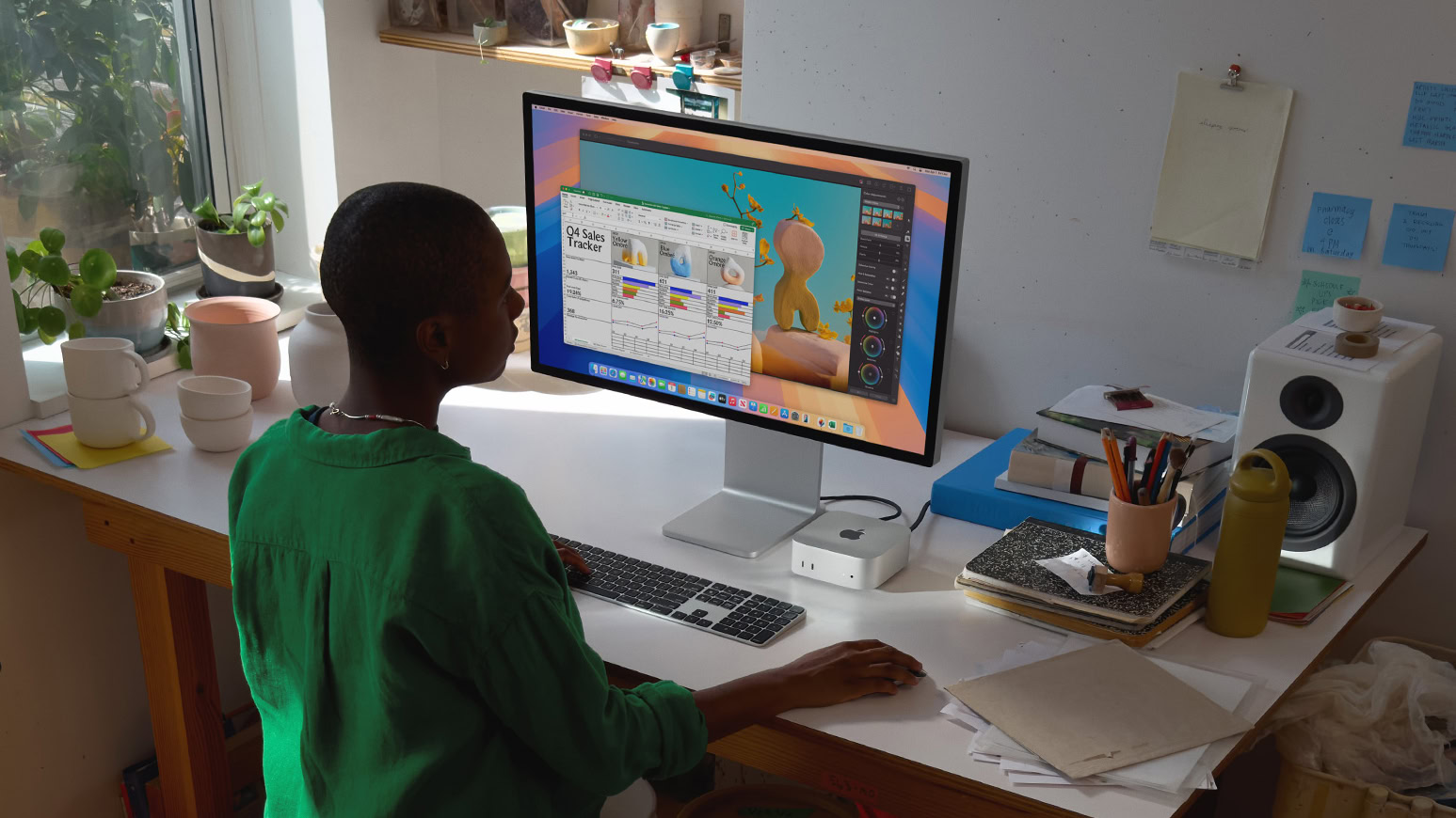 Woman using Apple Mac Mini M4