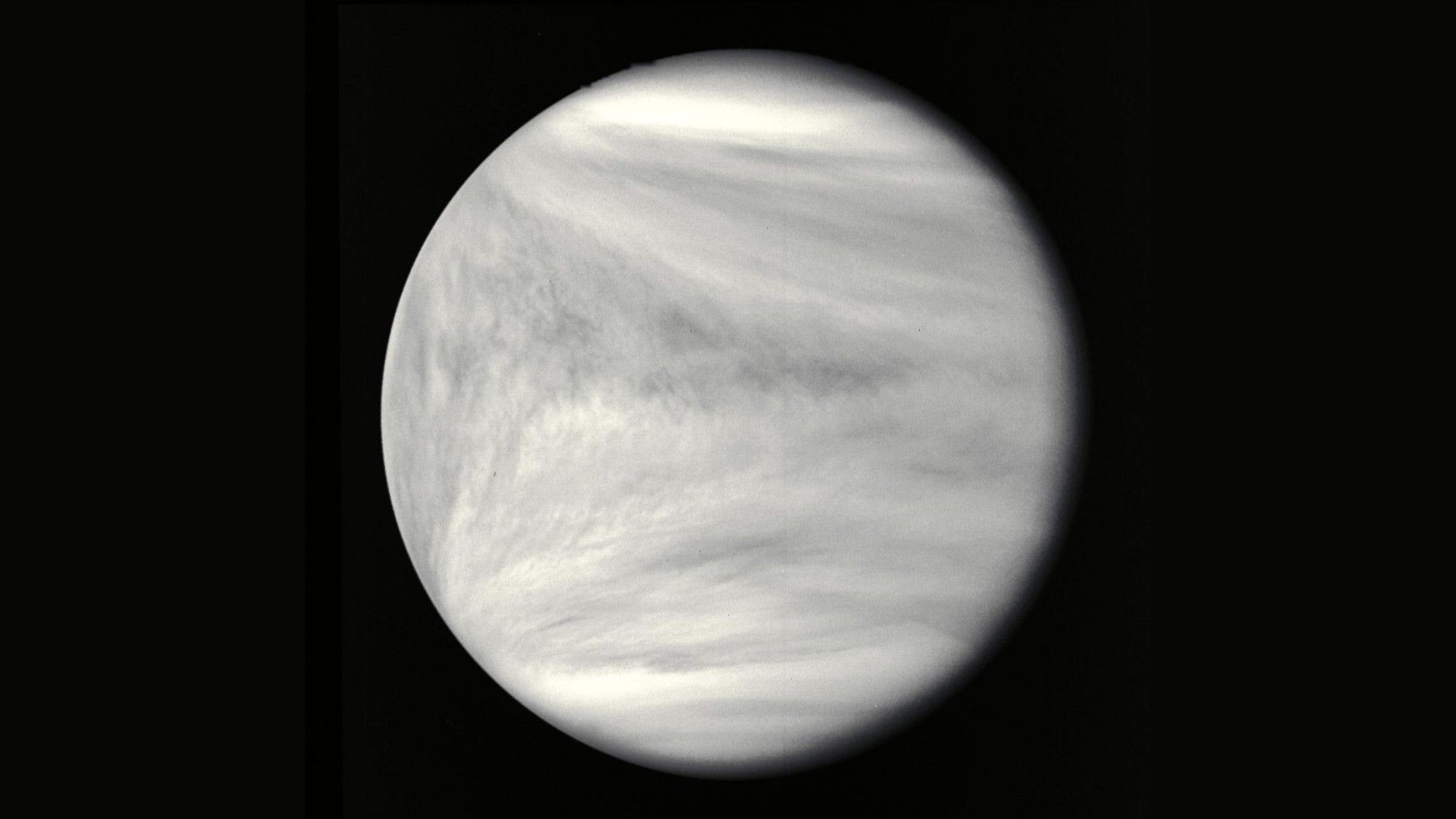 An image showing Venusian atmosphere and the planet's thick cloud cover. 