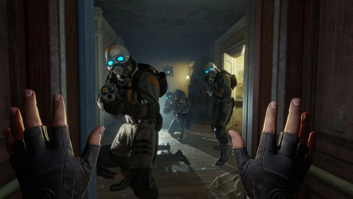 A gameplay screenshot of the VR game Half Life: Alyx; main character has their hands up with combatants pointing firearms at them.