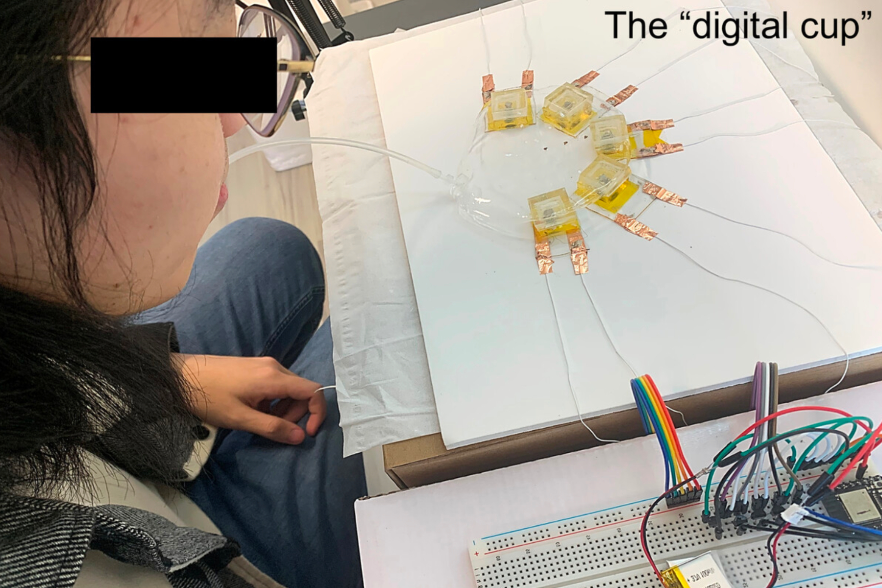 A person testing multi-taste sensor kit.