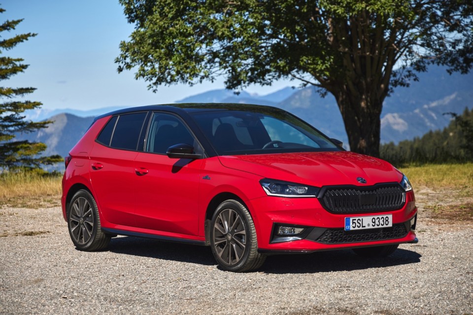 Red Skoda Fabia Monte Carlo parked outdoors.