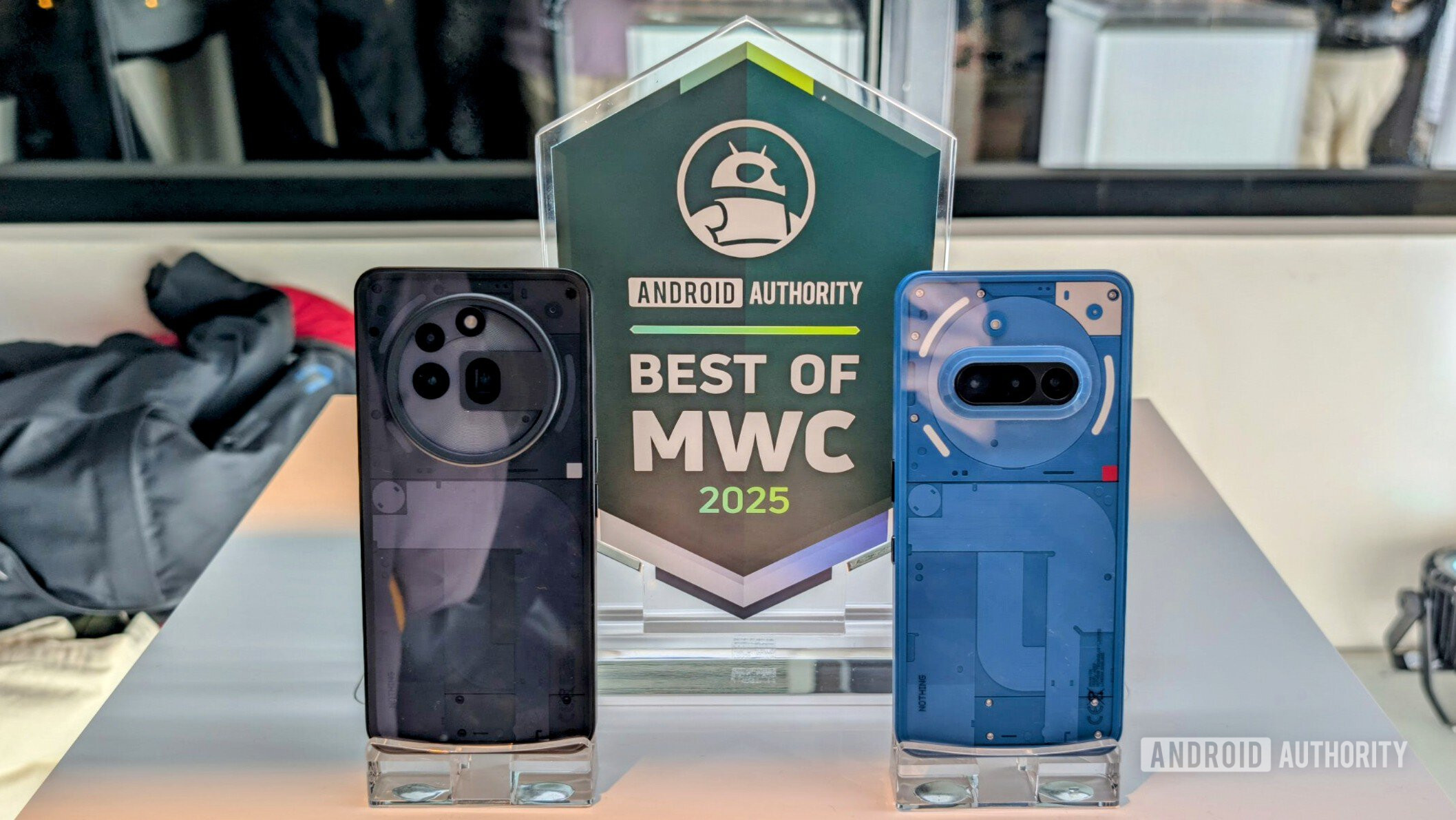 Nothing Phone 3a and Nothing Phone 3a Pro in front of the Best of MWC 2025 Award from Android Authority