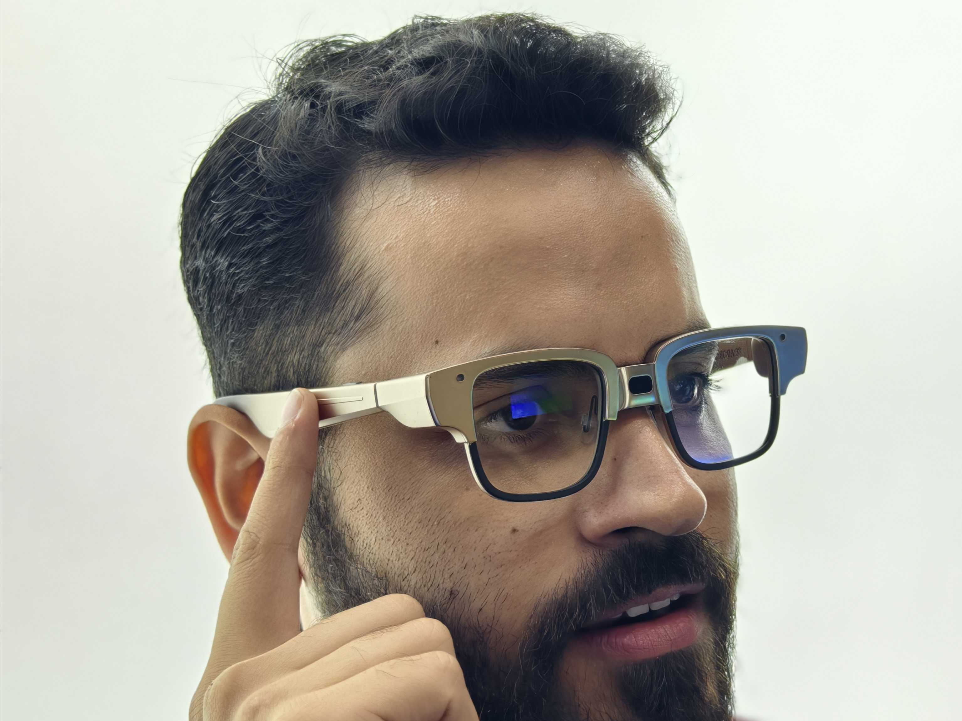 Prakhar Khanna wearing the Tecno AI Glasses Pro.