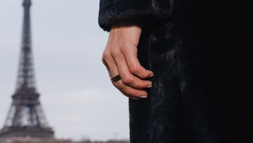 Person dressed in black wearing Circular Ring 2