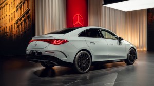 A rear 3/4 view of the 2026 Mercedes-Benz CLA EV