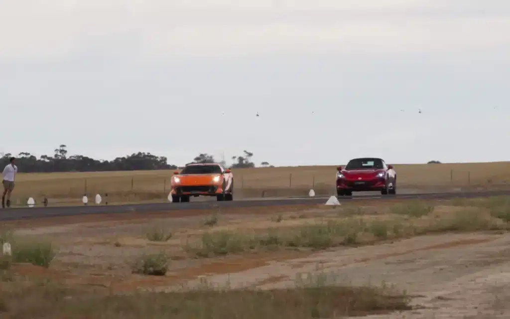 Ferrari 812 Competizione drag race versus electric MG Cyberster