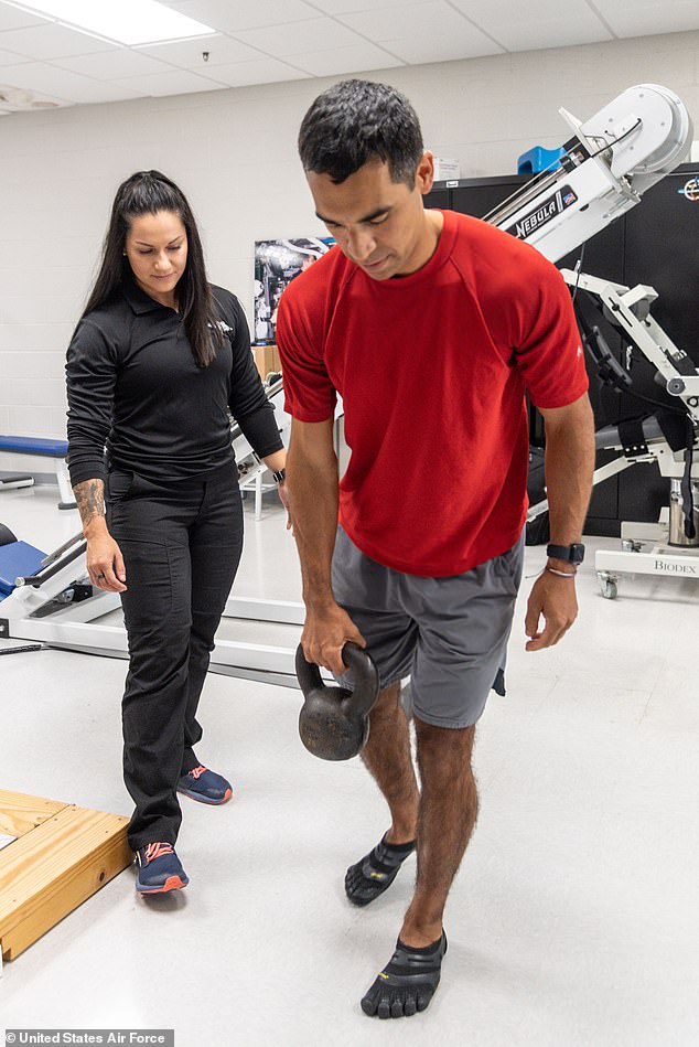 NASA astronaut Raja Chari performs strengthening exercises after returning from a 177-day-long ISS mission