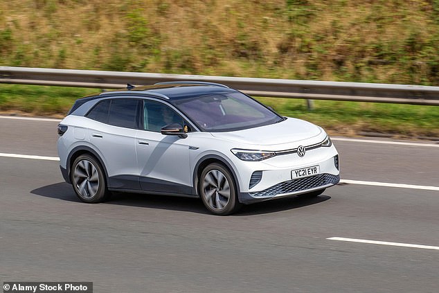 An electric VW travelling on the M6 motorway. The Vehicle Restraint Manufacturers Association (VRMA) says existing crash barriers are incapable of stopping heavy electric vehicles