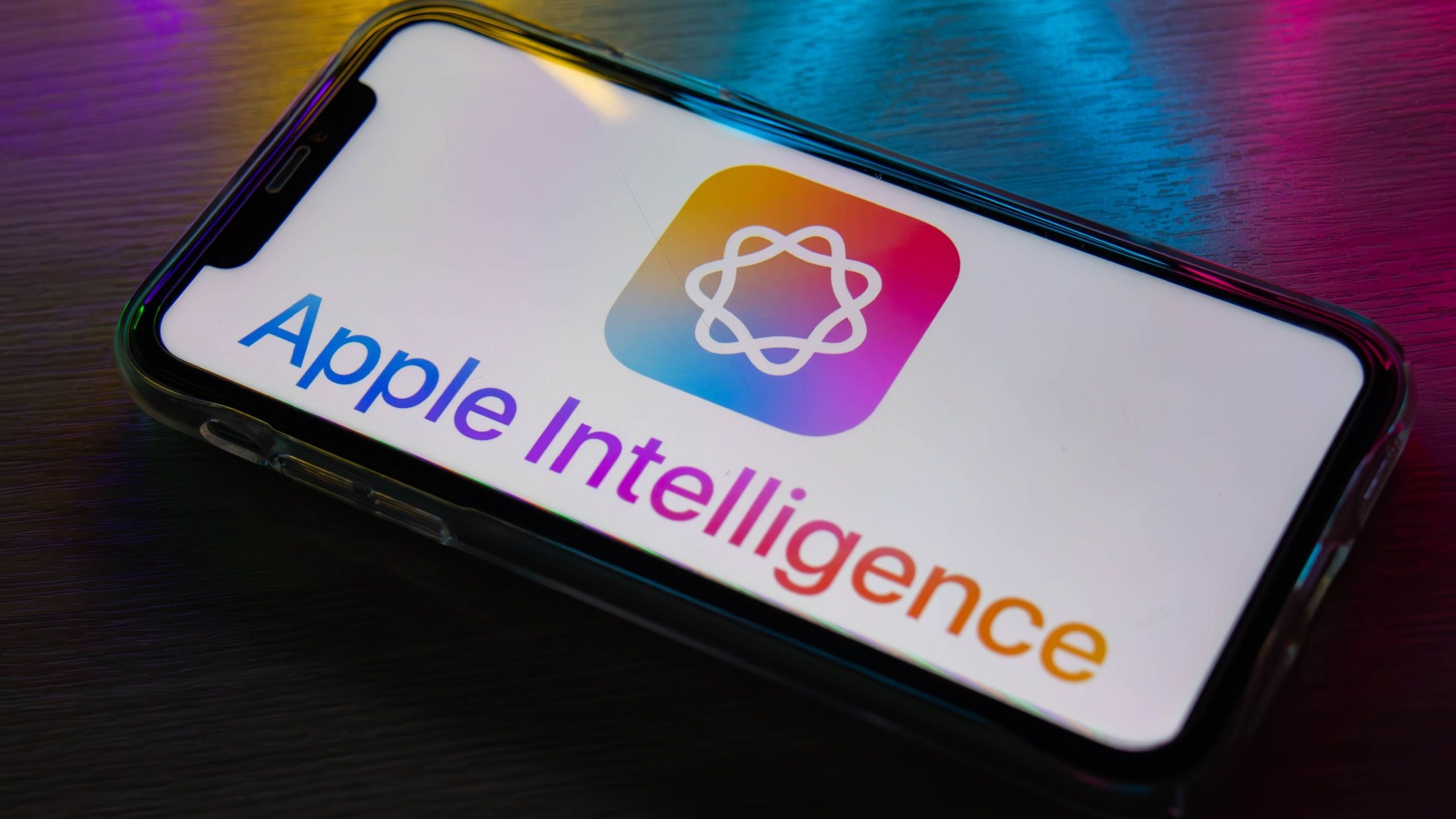 Apple Intelligence Logo and Text on an iPhone