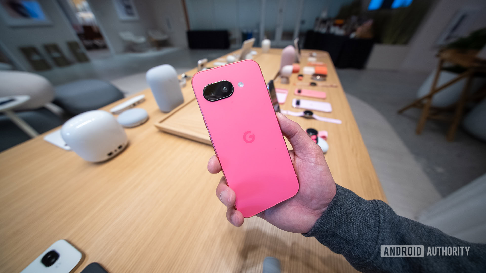 Google Pixel 9a pink in hand