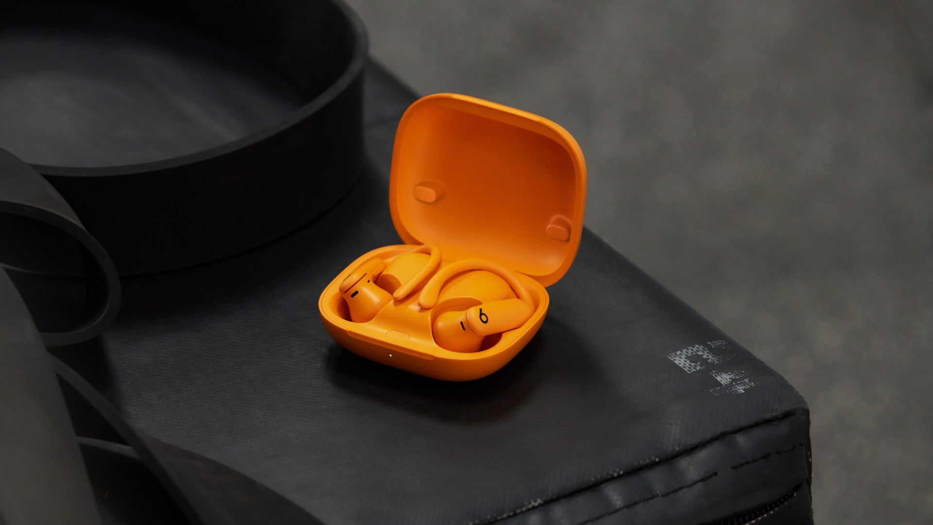 The PowerBeats Pro 2 in orange. 